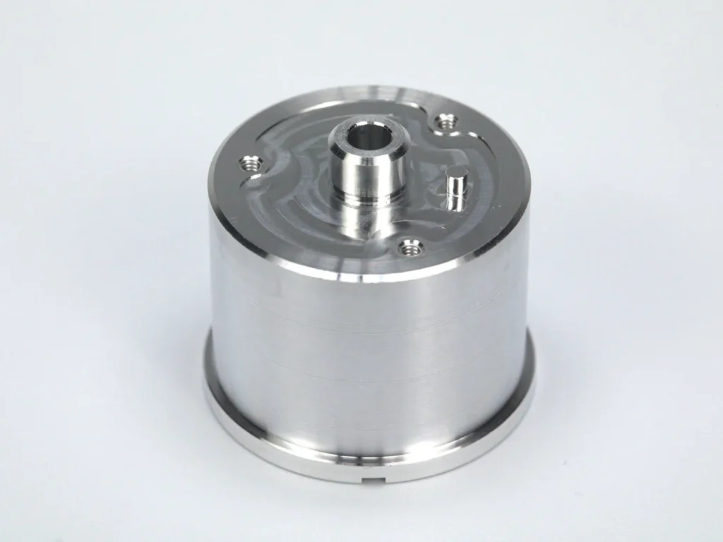 Machined metal cylinder component