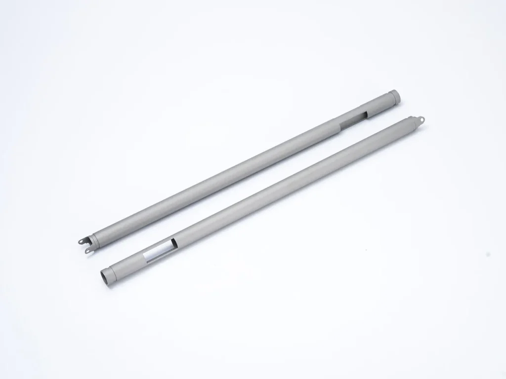 Two grey pens.