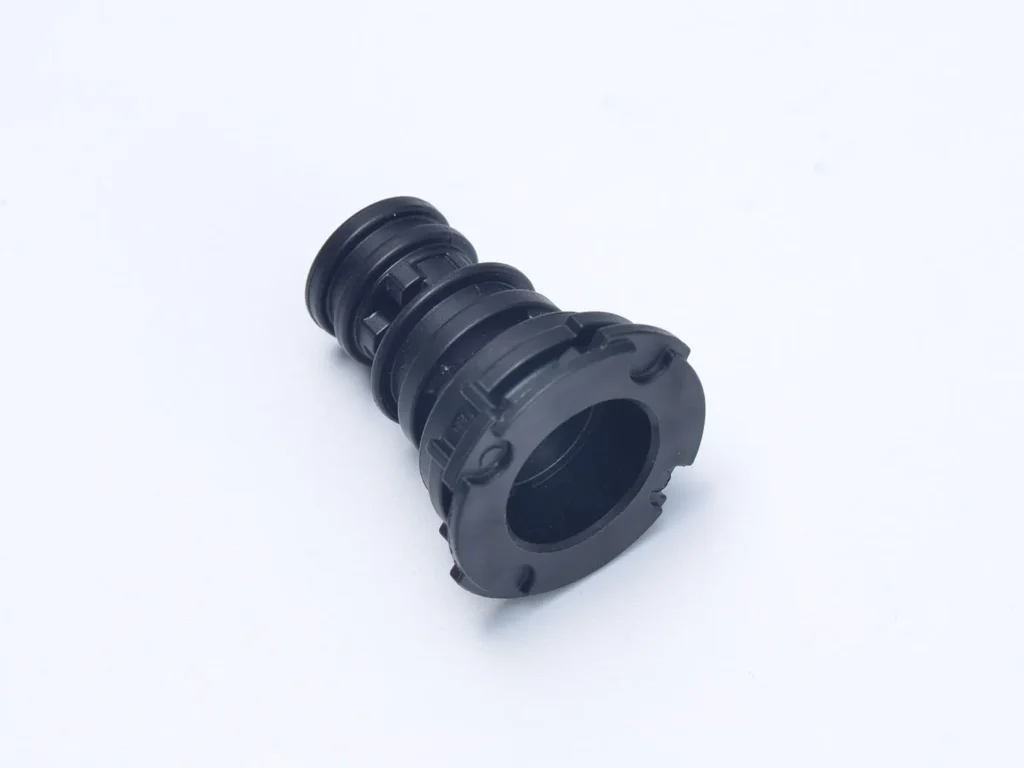 Black plastic plumbing fitting