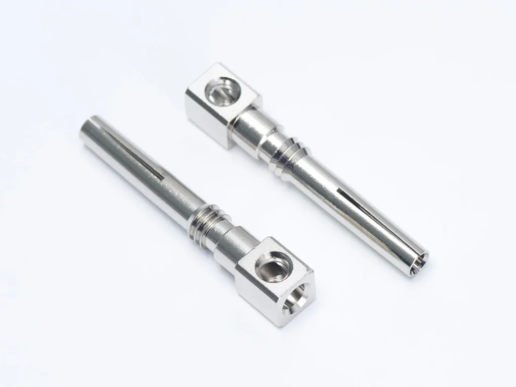 Metal machined parts on white