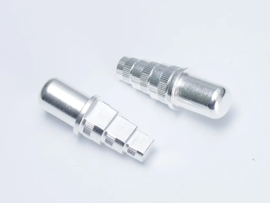 Metal adapters on white background