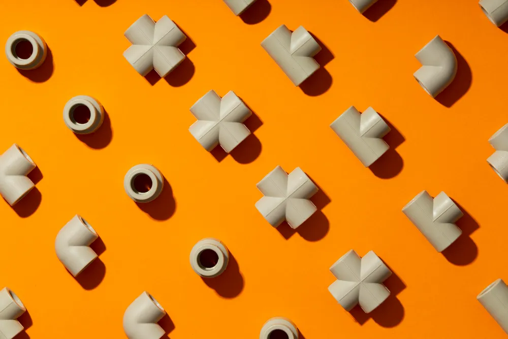 Plumbing fittings pattern on orange