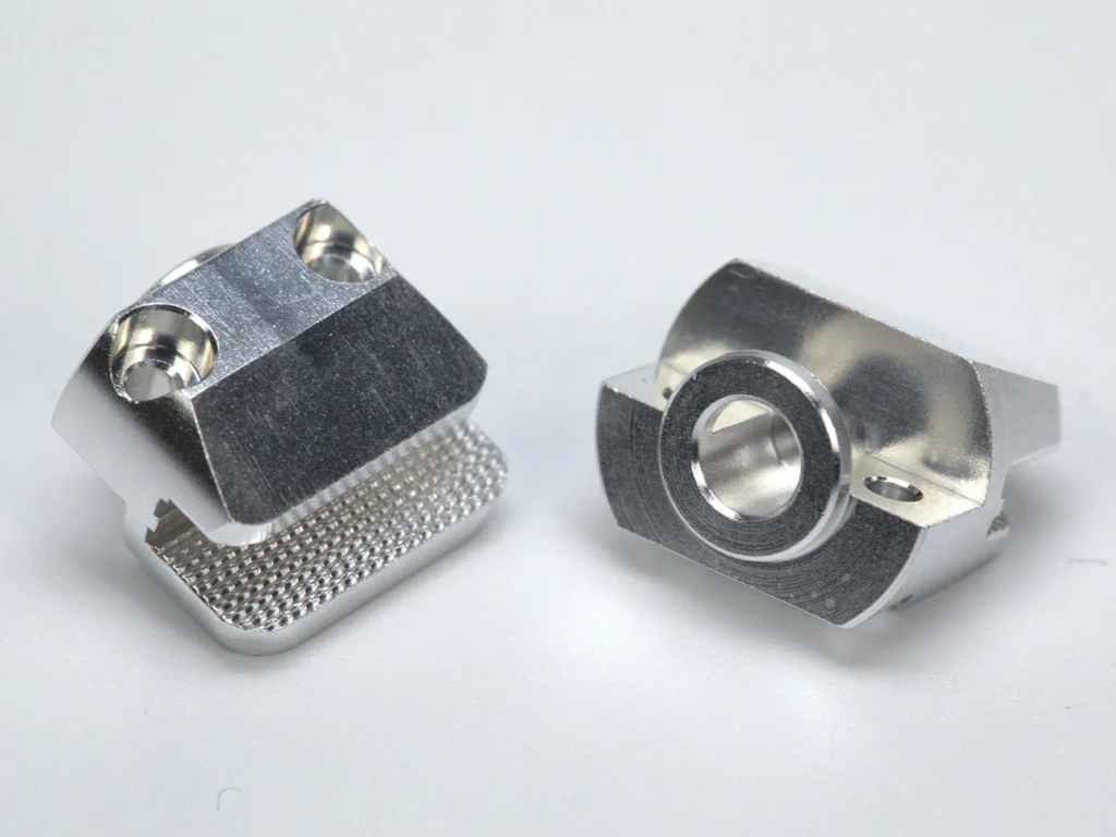Metal machined parts on white