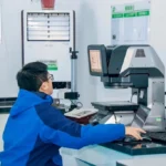 Technician works with measurement machine