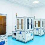 Cleanroom manufacturing equipment setup.